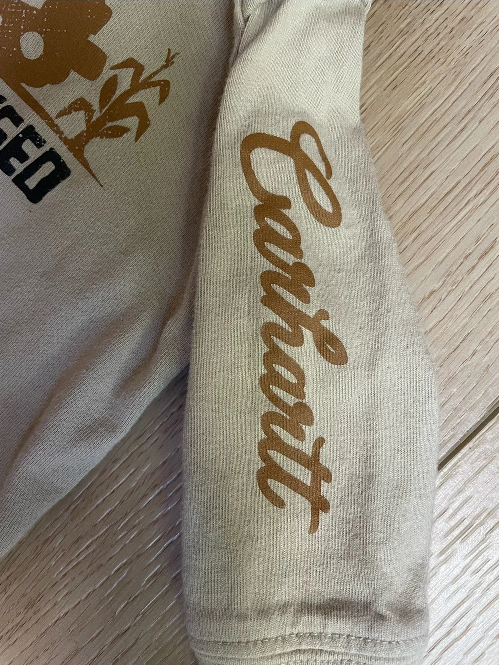 Carhartt Cream Baby Long Sleeve Onesie with Yellow Logo